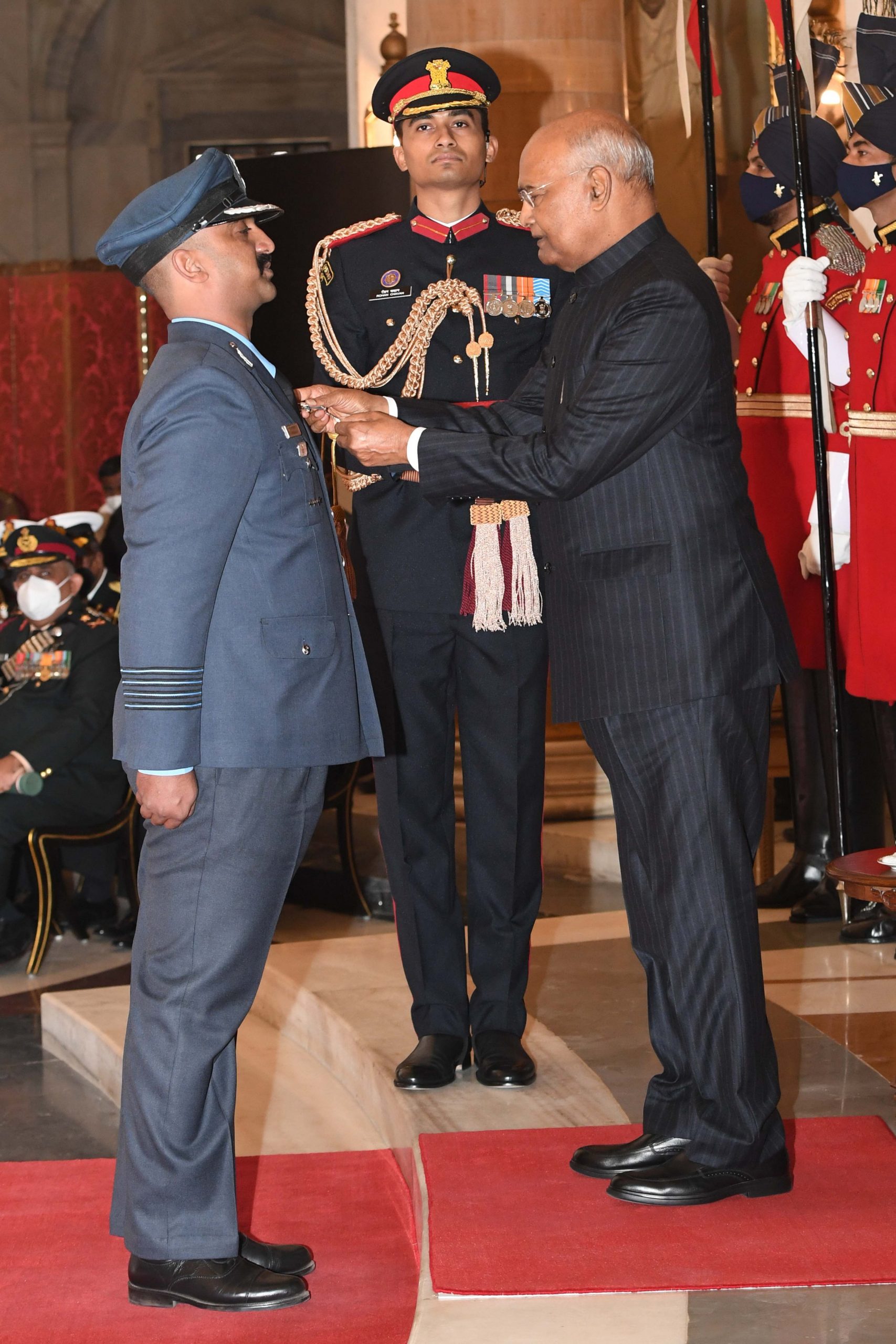 President Kovind presents Vir Chakra to Wing Commander (now Group Captain) Varthaman Abhinandan. He showed conspicuous courage, demonstrated gallantry in the face of the enemy while disregarding personal safety and displayed exceptional sense of duty.